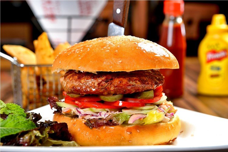 This South Delhi Cafe Is Giving Free Burgers For An Entire Year!