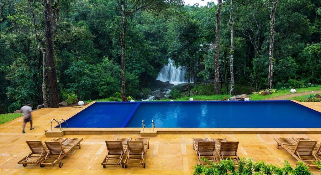 This Resort Offers Hanging Cottages, Indoor River And Infinity Pool Overlooking A Waterfall